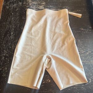 SKIMS body high waisted shorts, medium in the color sand